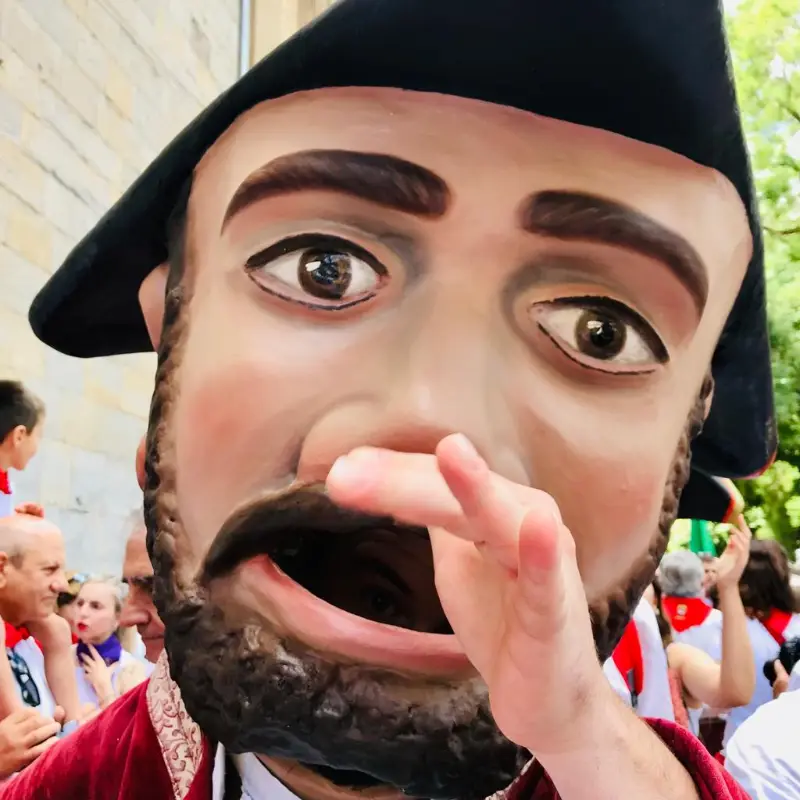 Close-up of a cabezudo from the troupe that accompanies the procession (2022).