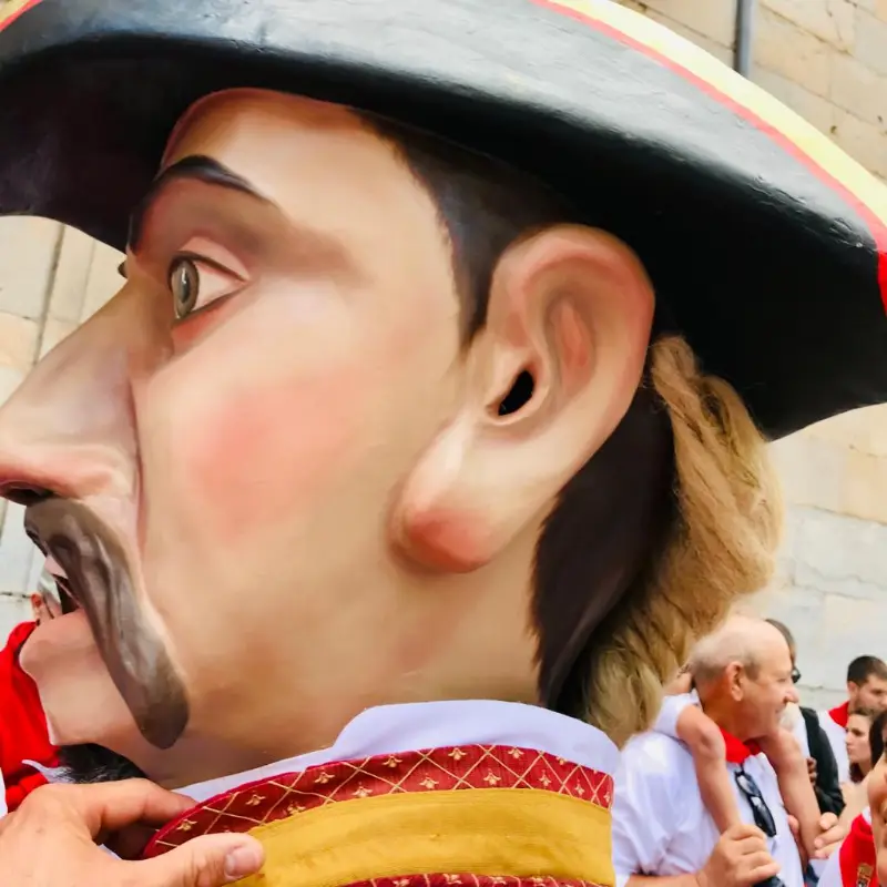 One of the big-heads (cabezudos) that escort the procession on July 7, 2022.