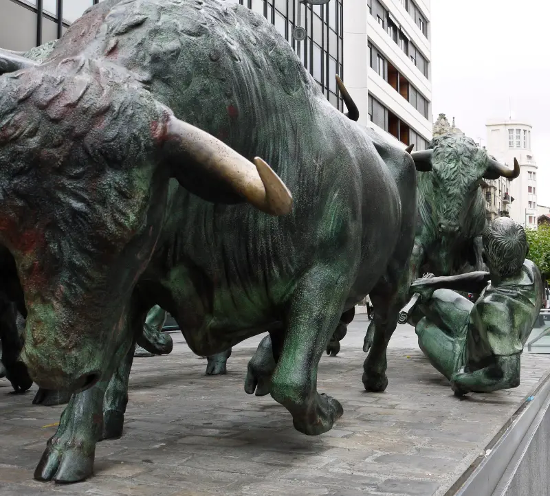 The bronze runners and bulls of the Encierro monument.