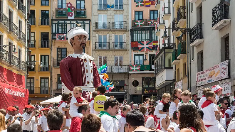 A giant towers over the street: San Fermín happens in the street (July 13, 2018).