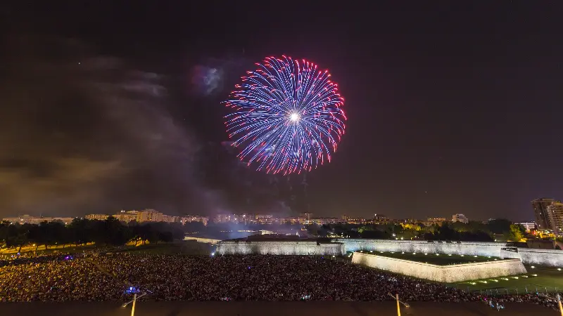 A blue burst crowns the nightly display, July 9, 2018.