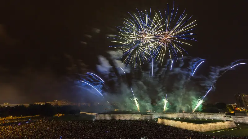 Fireworks fill the sky above the city (2018).