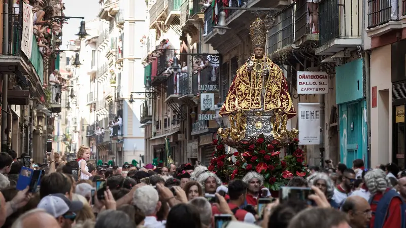 The statue of San Fermín makes its way through packed streets on July 7, 2018.